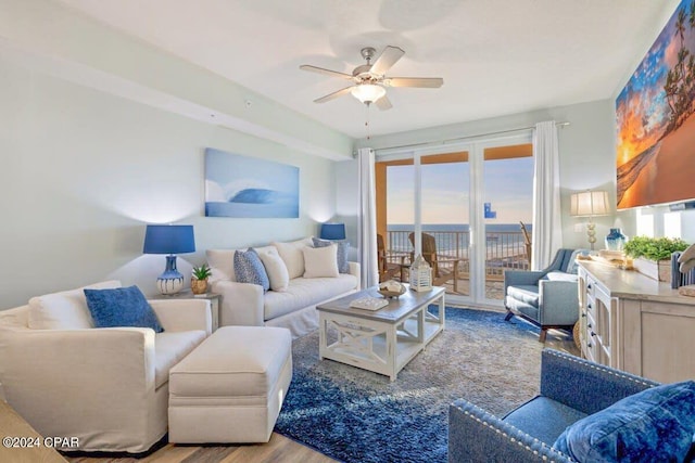 living room with hardwood / wood-style floors and ceiling fan