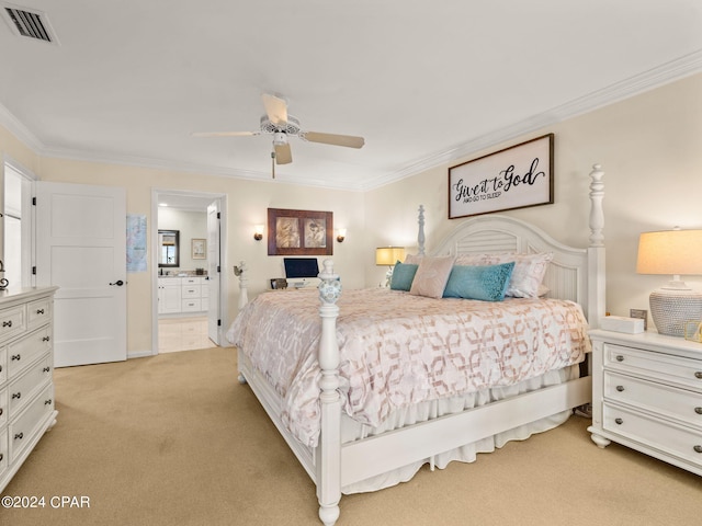 bedroom featuring light colored carpet, ornamental molding, ensuite bath, and ceiling fan