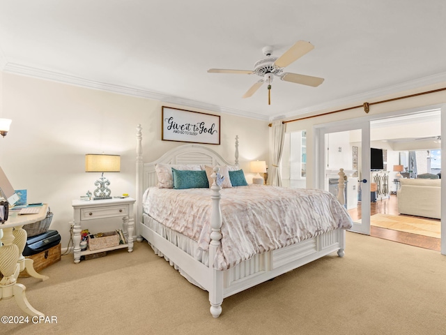 bedroom featuring ceiling fan, carpet, and crown molding