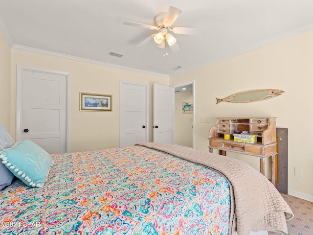 carpeted bedroom with crown molding and ceiling fan