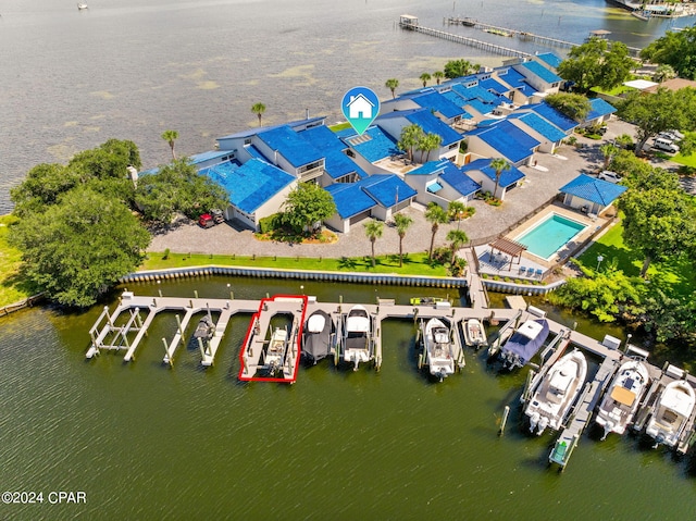 birds eye view of property featuring a water view