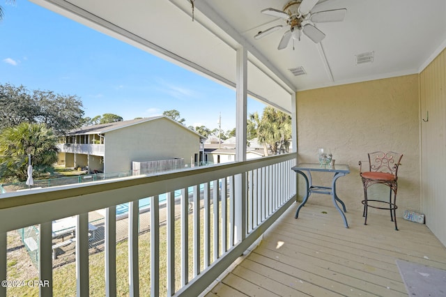 balcony featuring ceiling fan