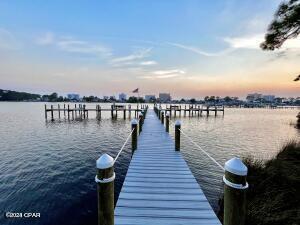 dock area with a water view