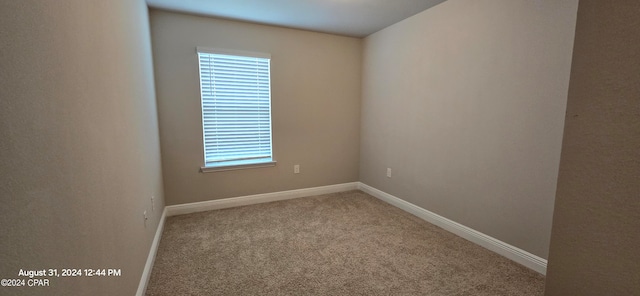 view of carpeted spare room