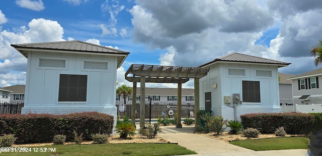 exterior space featuring a pergola