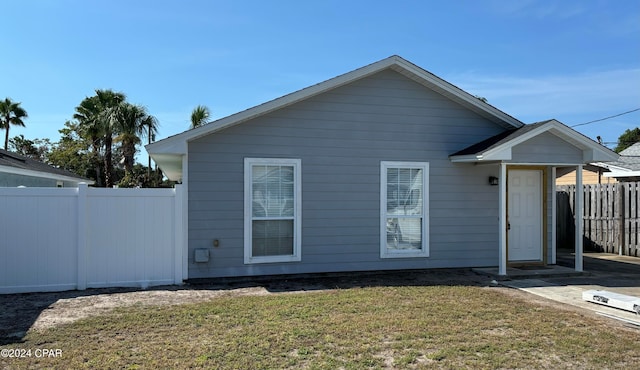 exterior space featuring a front lawn