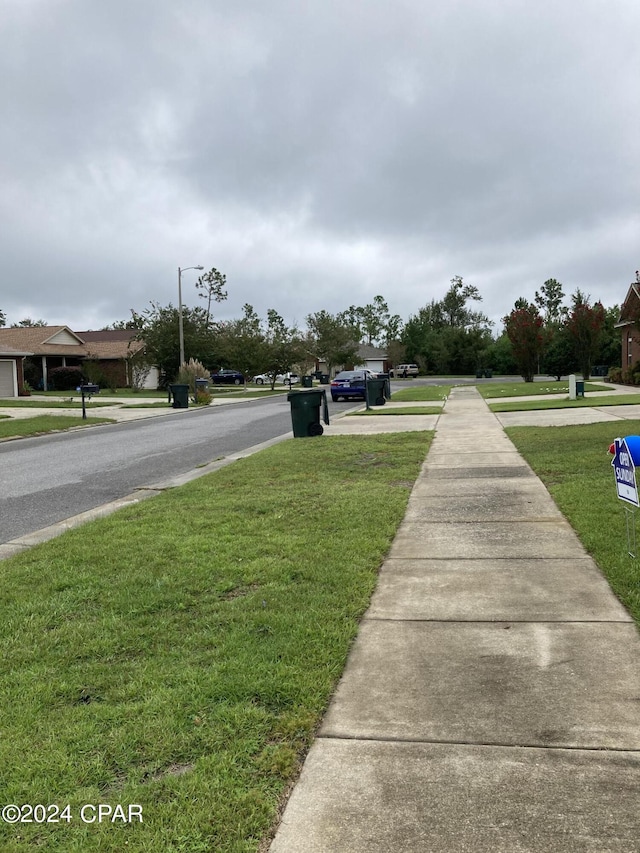 view of street with street lighting and sidewalks