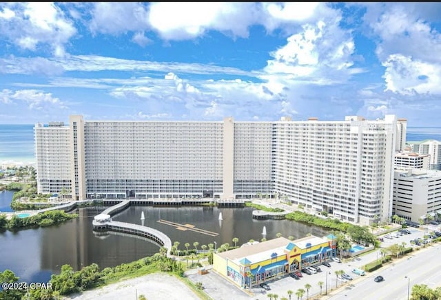 aerial view featuring a water view and a view of city