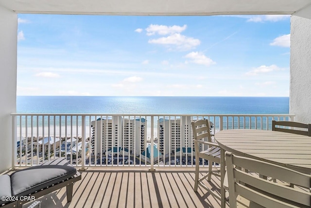 balcony featuring a water view