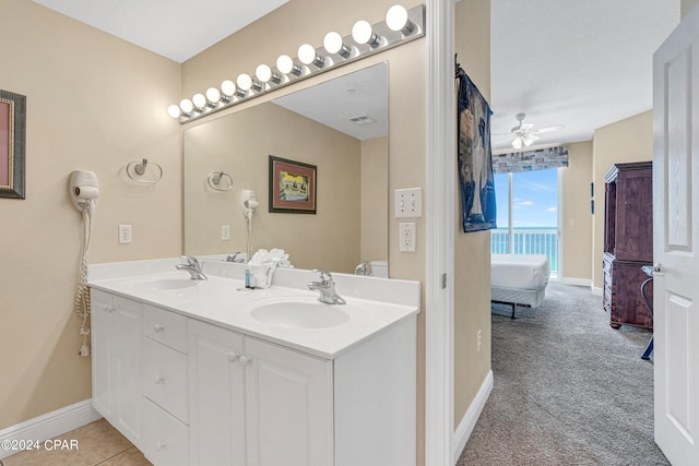 bathroom with vanity and ceiling fan