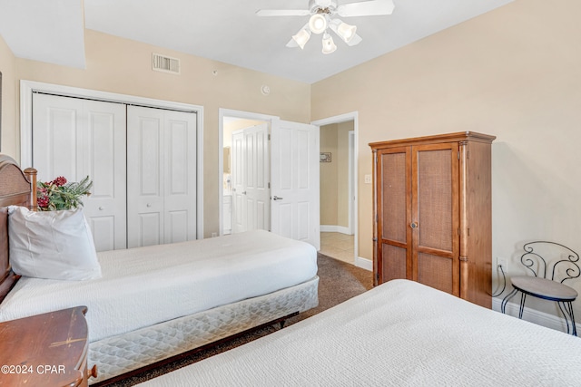 bedroom with carpet flooring, ceiling fan, and a closet