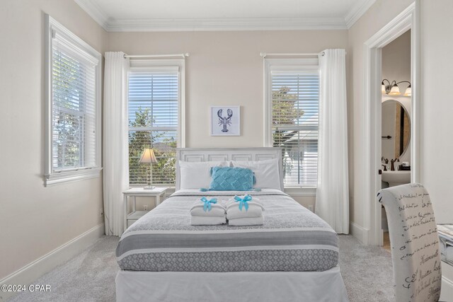 bedroom with multiple windows, light colored carpet, and crown molding