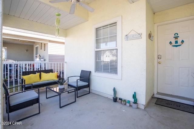 view of patio / terrace with an outdoor living space and ceiling fan