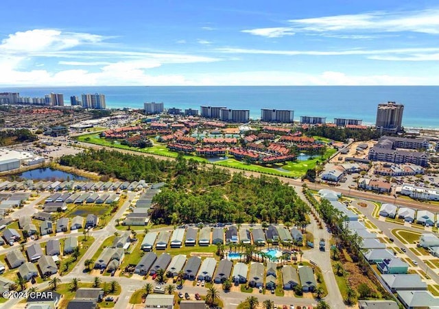 drone / aerial view with a water view