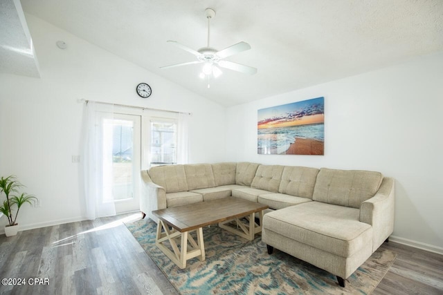 living room with high vaulted ceiling, hardwood / wood-style floors, and ceiling fan