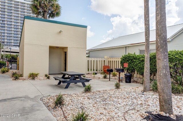 back of property with a patio area