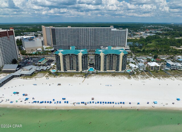 aerial view with a view of the beach and a water view