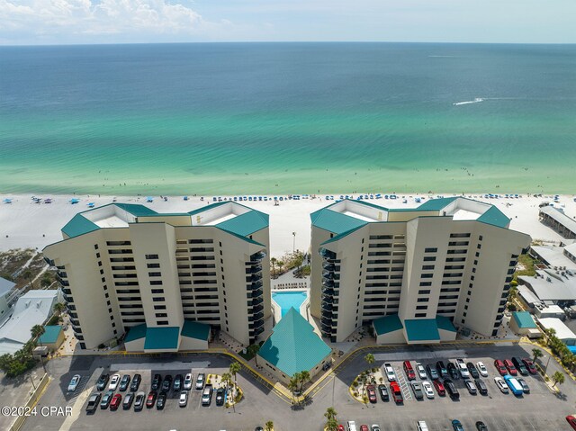 aerial view featuring a beach view and a water view