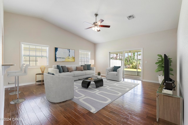 living room with vaulted ceiling, ceiling fan, and plenty of natural light