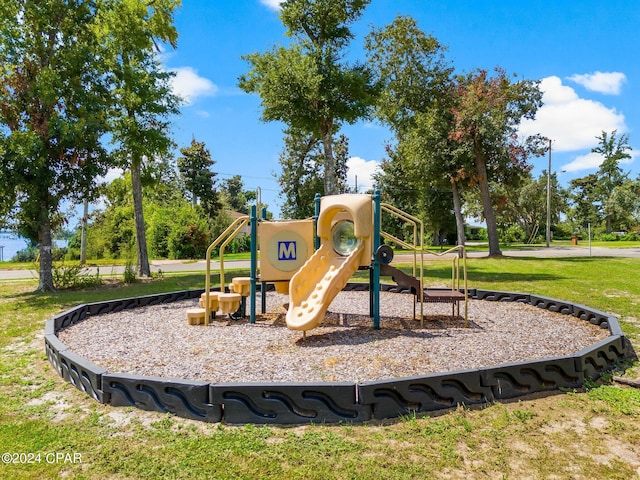 view of play area with a yard