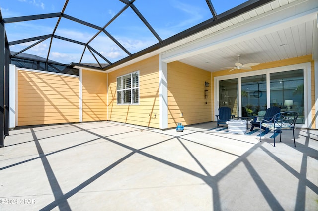 view of patio / terrace with a lanai and ceiling fan