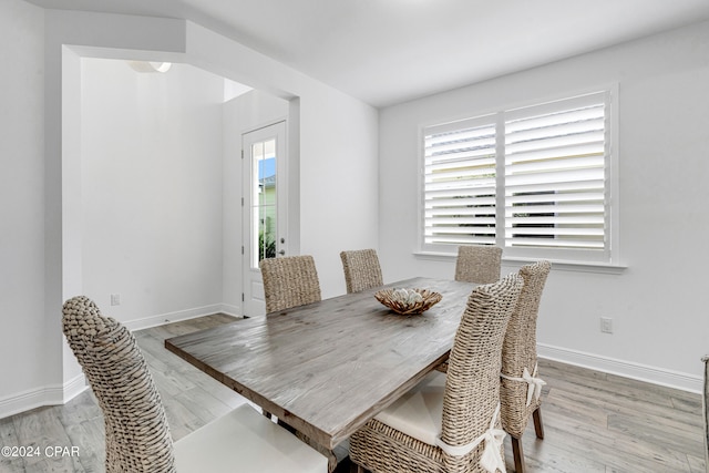 dining space featuring light hardwood / wood-style floors