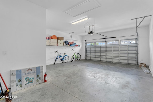 garage featuring a garage door opener