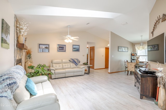 living room with lofted ceiling, ceiling fan, a fireplace, baseboards, and light wood-type flooring