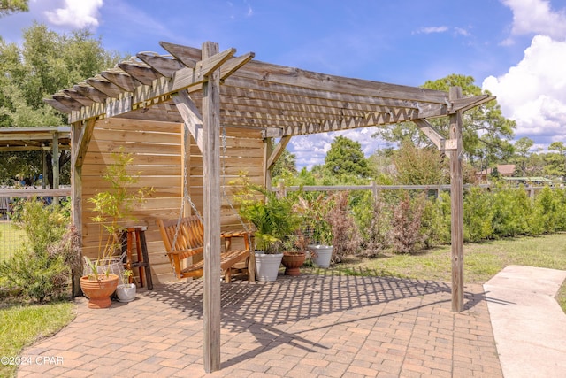 view of patio featuring a pergola