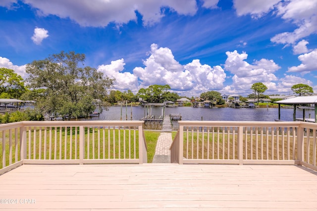 deck featuring a water view and a dock