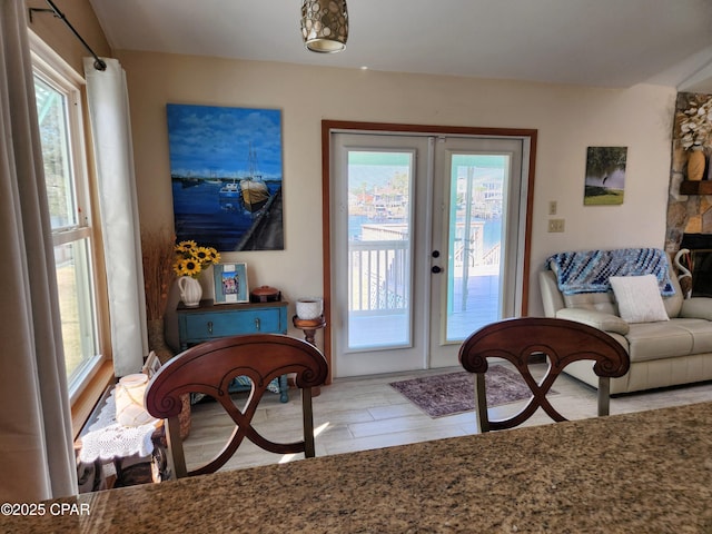 entryway featuring french doors and wood finished floors