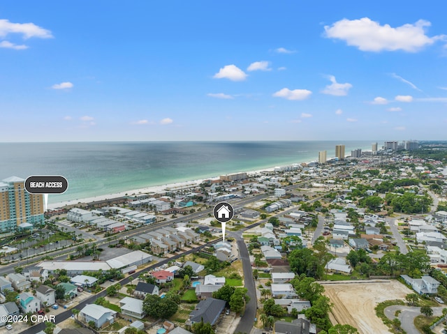 bird's eye view with a beach view and a water view