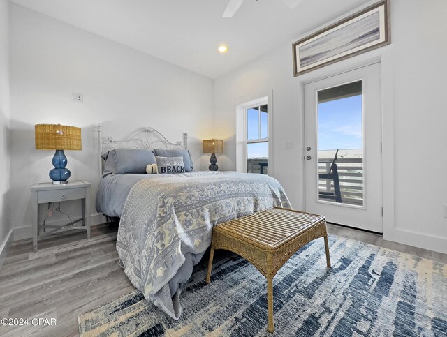 bedroom with baseboards, light wood-style floors, ceiling fan, and recessed lighting