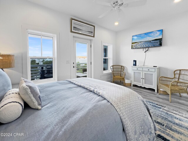 bedroom with ceiling fan, wood finished floors, and recessed lighting