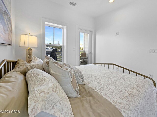 bedroom featuring visible vents and recessed lighting