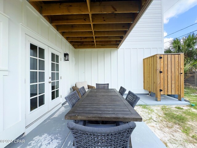 view of patio / terrace featuring outdoor dining space and french doors