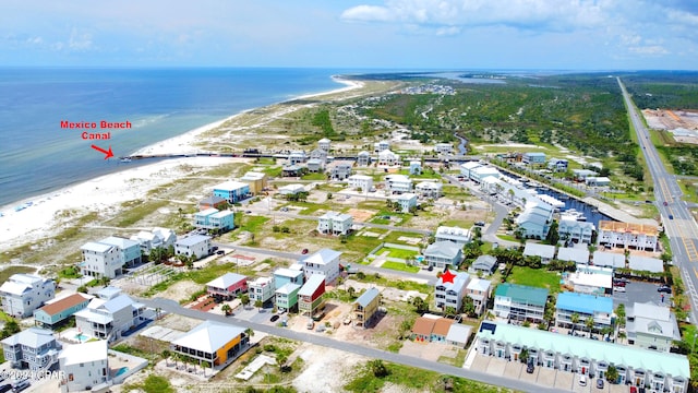 bird's eye view with a view of the beach and a water view