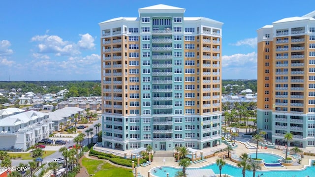 view of property featuring a community pool