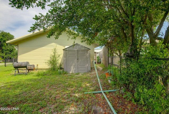 exterior space with a shed