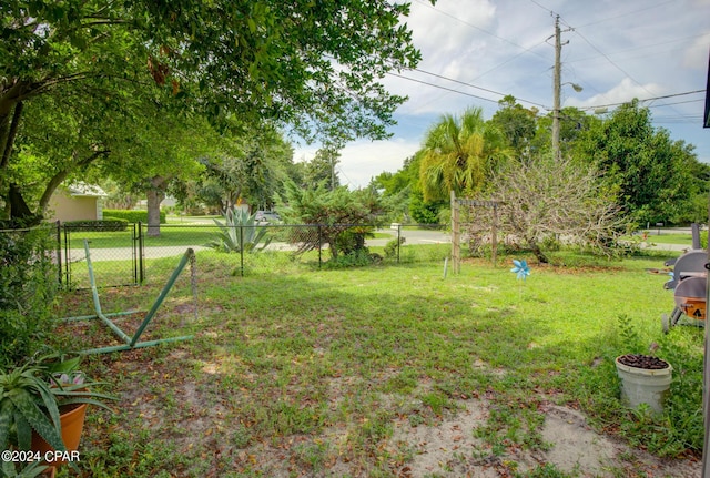 view of yard with fence