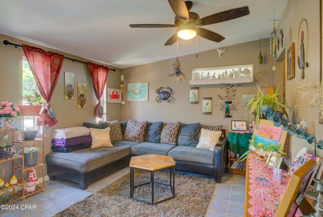 tiled living room featuring ceiling fan