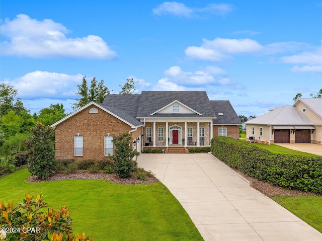 view of front of house featuring a garage and a front yard