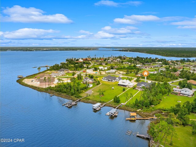 bird's eye view with a water view