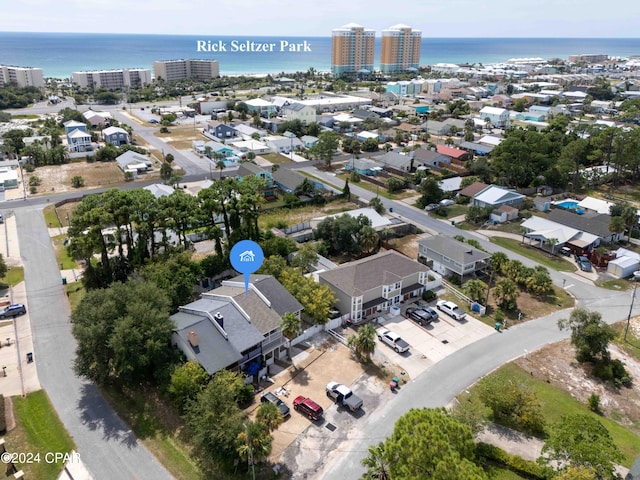 bird's eye view with a water view