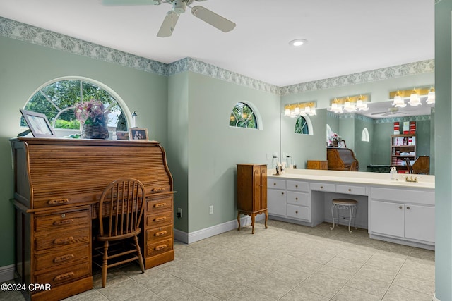 bathroom featuring tile patterned flooring, ceiling fan, and vanity