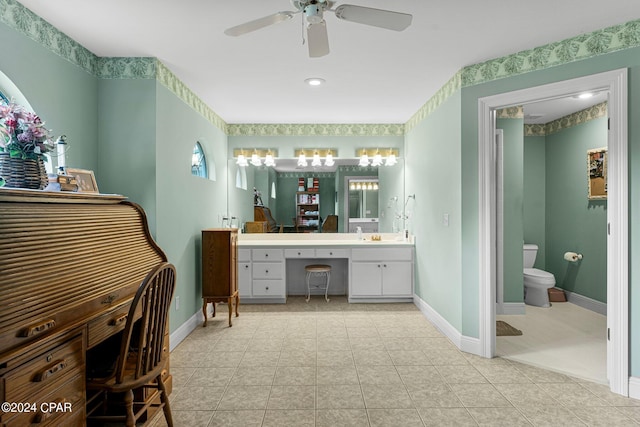 bathroom featuring tile patterned flooring, ceiling fan, vanity, and toilet