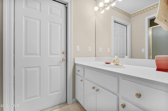 bathroom with tile patterned floors, a shower with shower door, and vanity