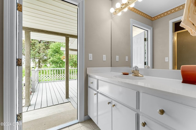 bathroom featuring tile patterned floors and vanity