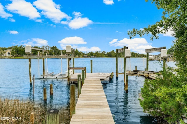 view of dock with a water view