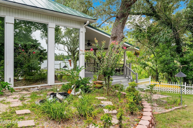 view of yard featuring ceiling fan